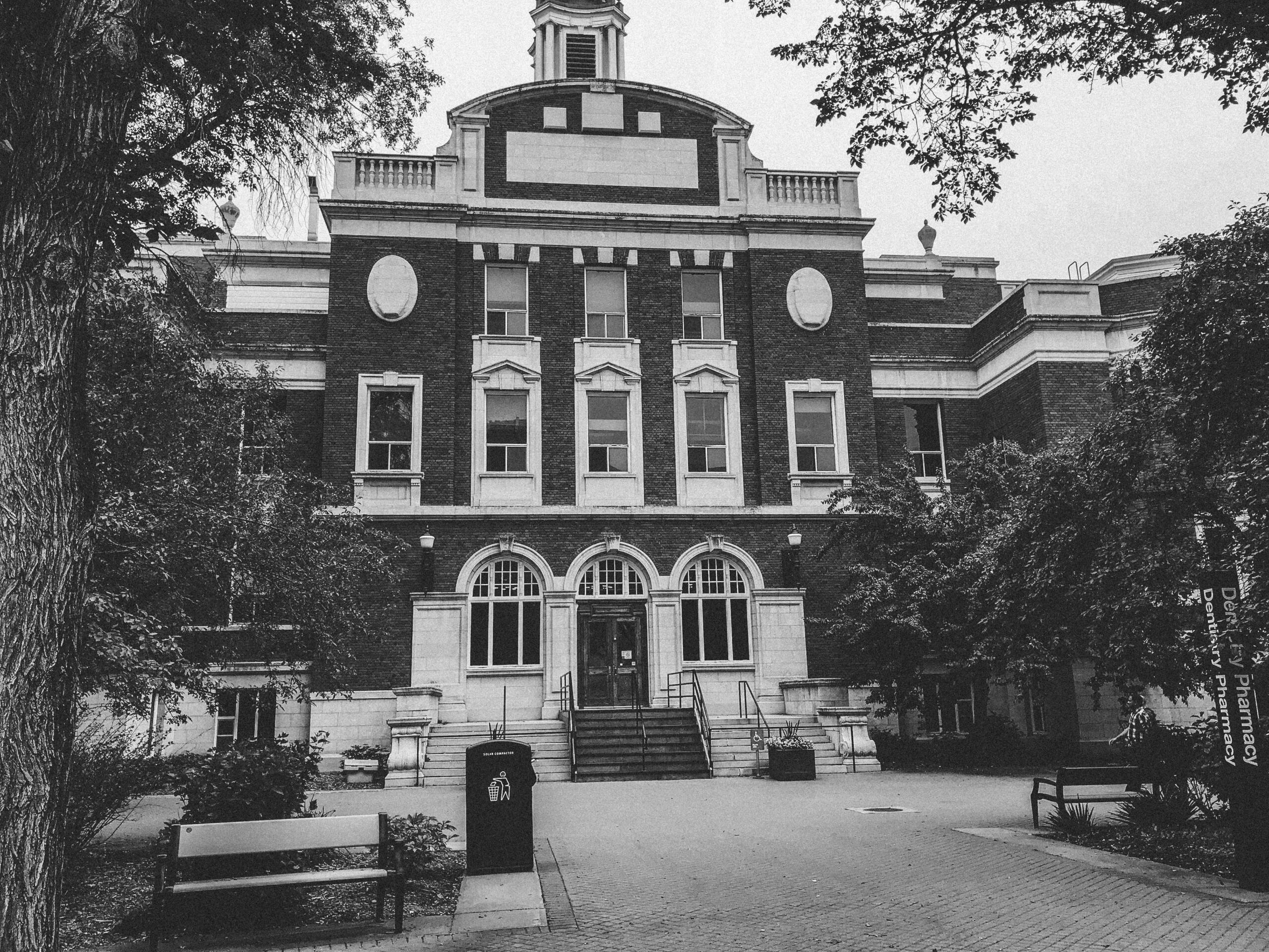 a black and white image of a historic building at the University of Alberta.