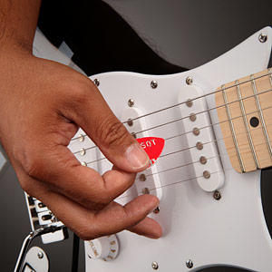 Comment jouer de la guitare avec un médiator ? 
