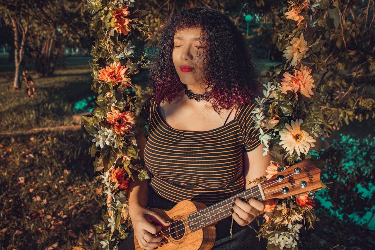 guitariste femme avec fleurs
