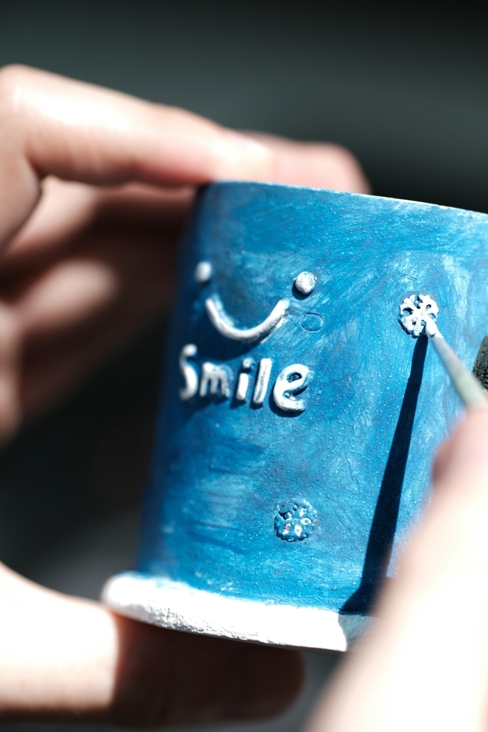 sourire smile céramique bleue