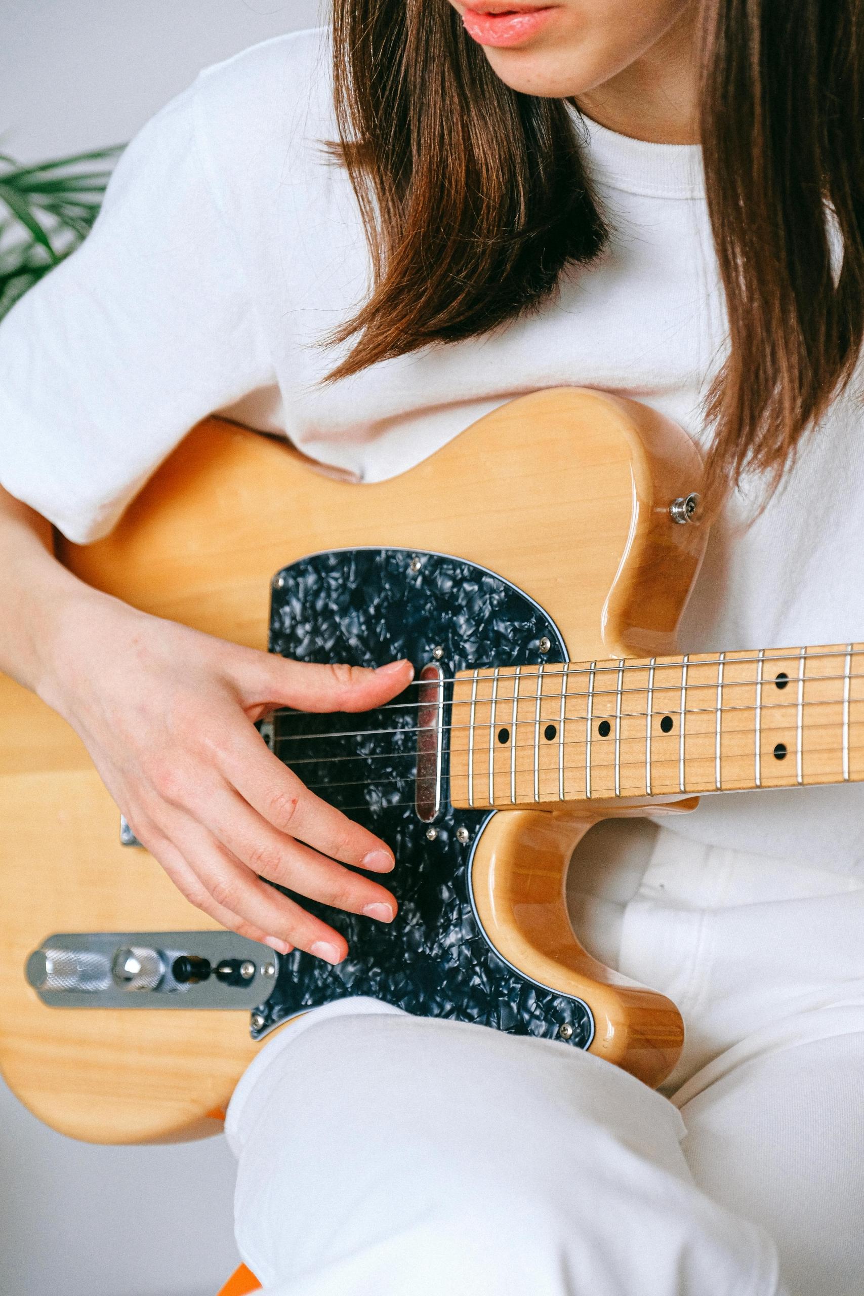 Tocar la guitarra con una mano