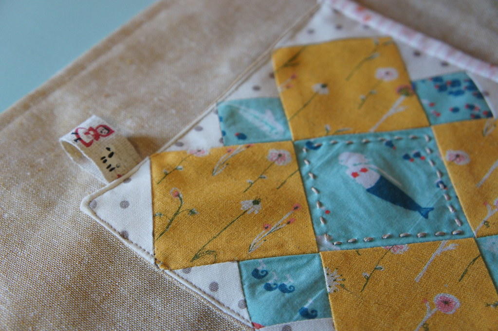 Patchwork con telas celestes y amarillas