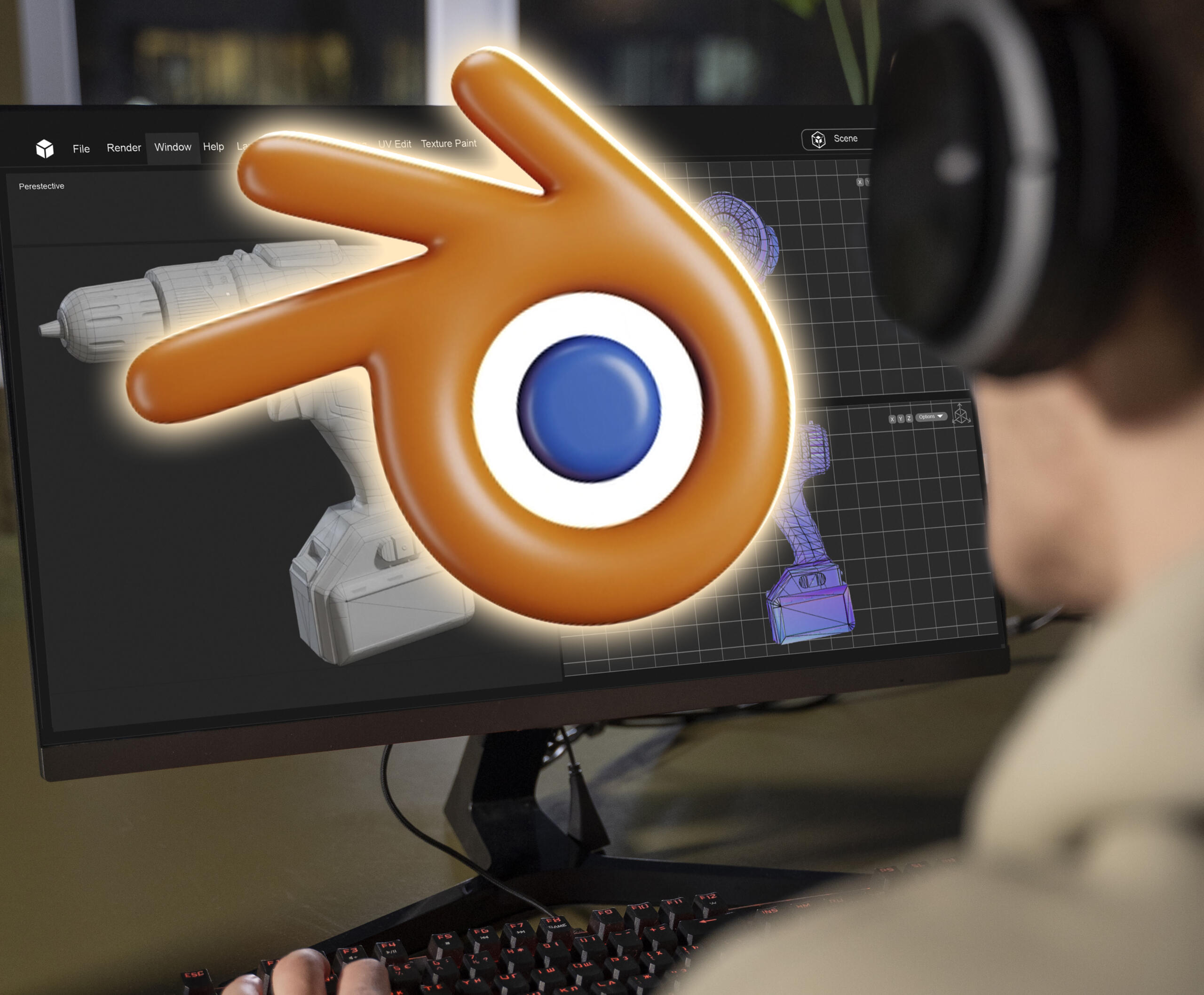 logo de blender saliendo de una pantalla de computadora con programa de modelado 3d abierto
