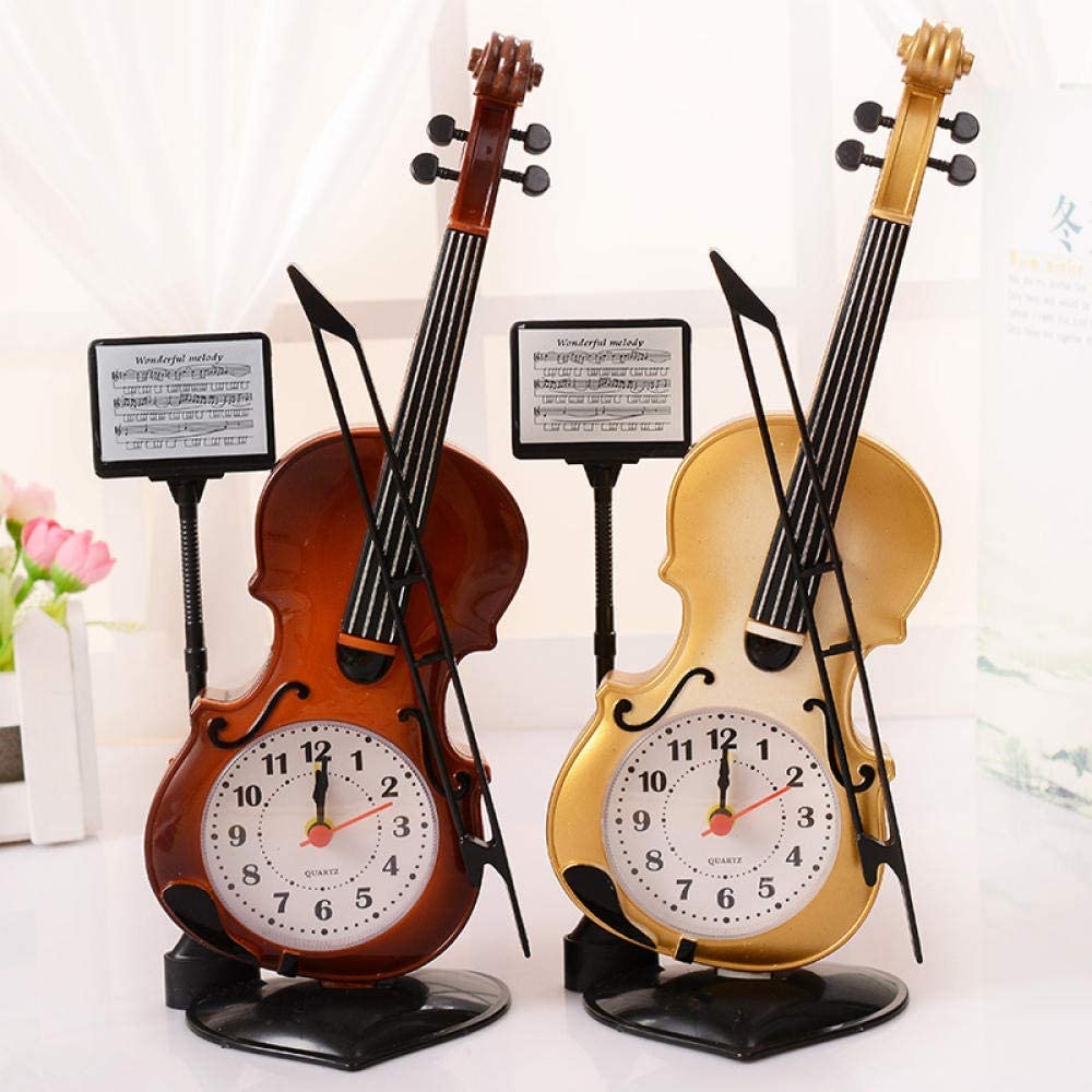 Relojes con forma de violines, con bases.
