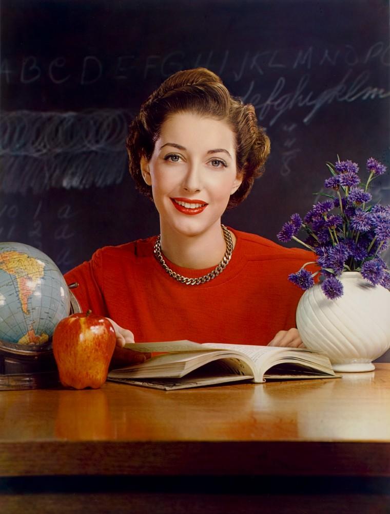 Timken Roller Bearing Co., calendar, September 1950, teacher at desk