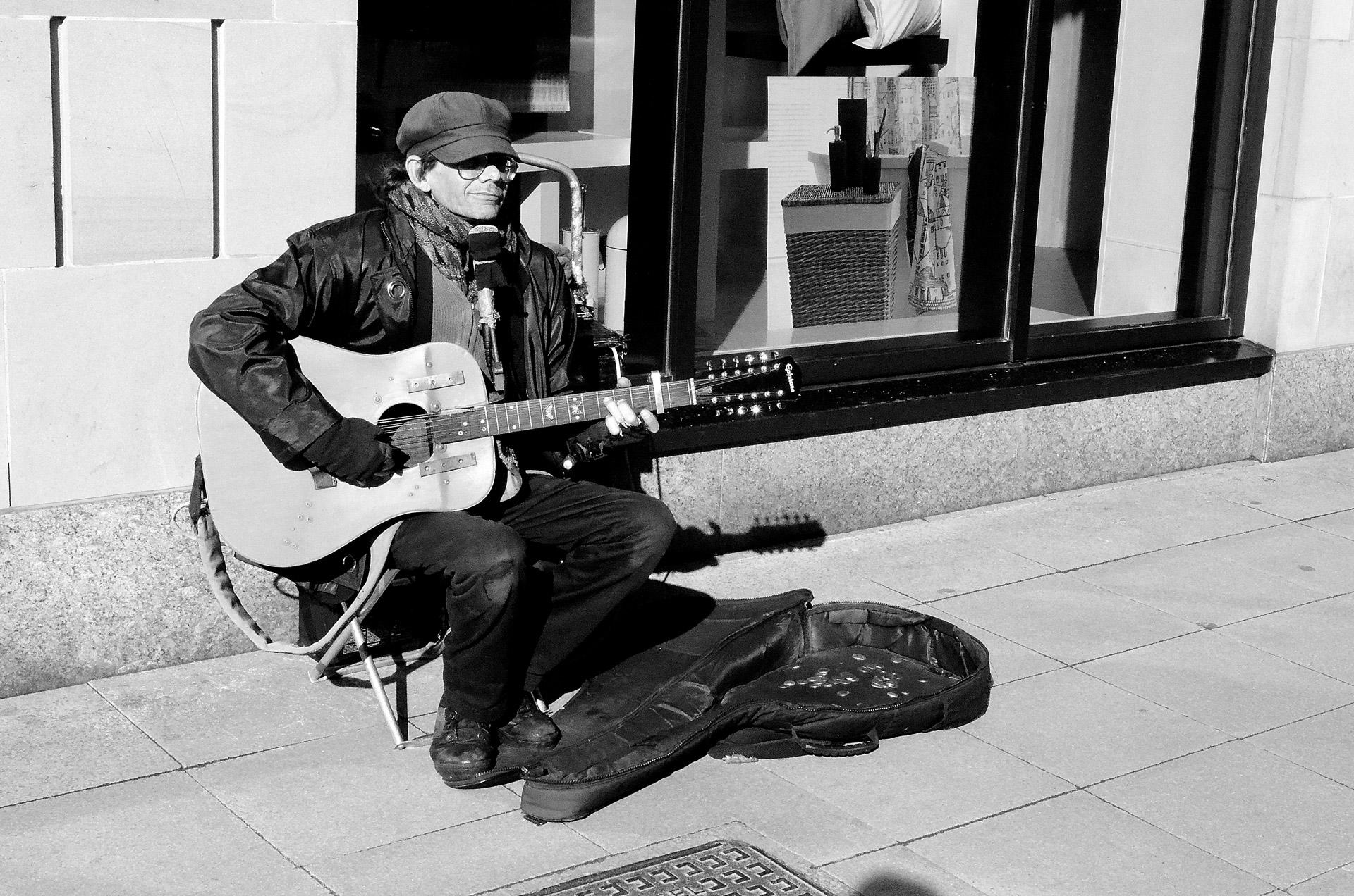 man-playing-a-guitar