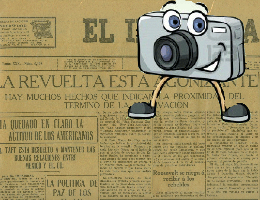 Periódico y camara.