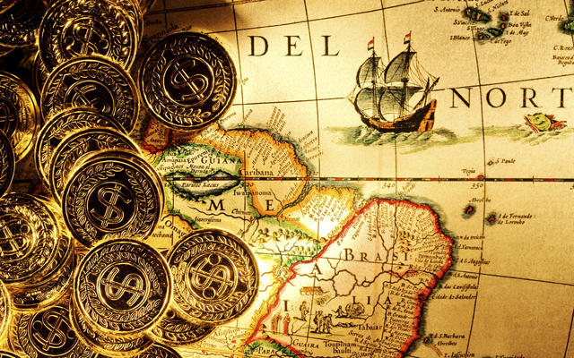 Símbolos de divisas de color amarillo, sobre un mapa de aspecto antiguo.
