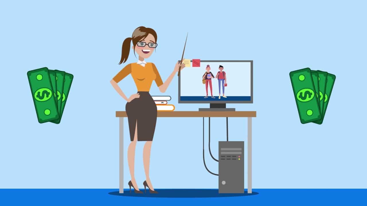 Profesora frente a un computador: Dinero junto a un computador.