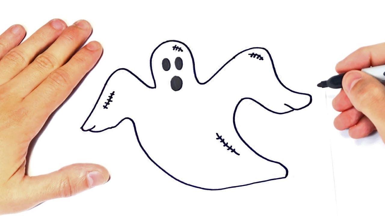 Manos alrededor del dibujo de un fantasma fácil de dibujar