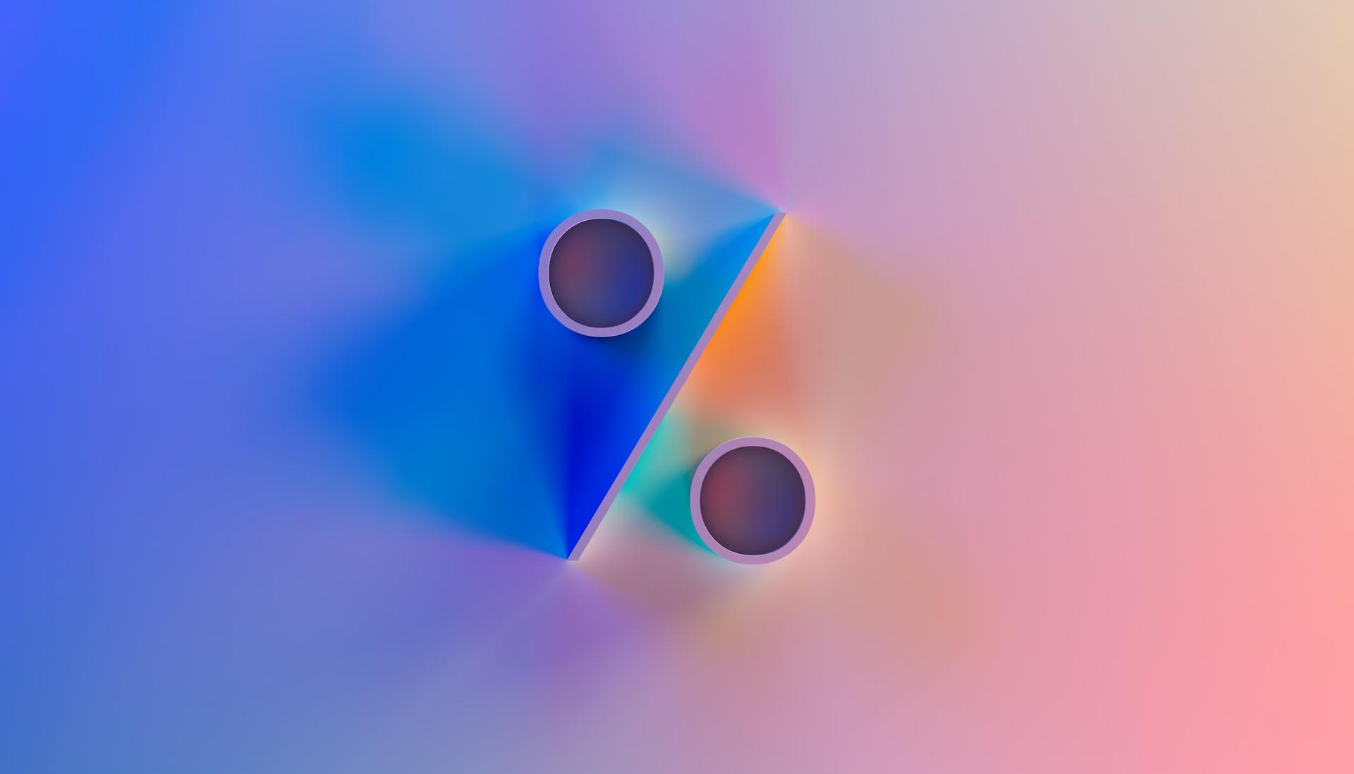 Símbolo de la división en colores azul y rosa.