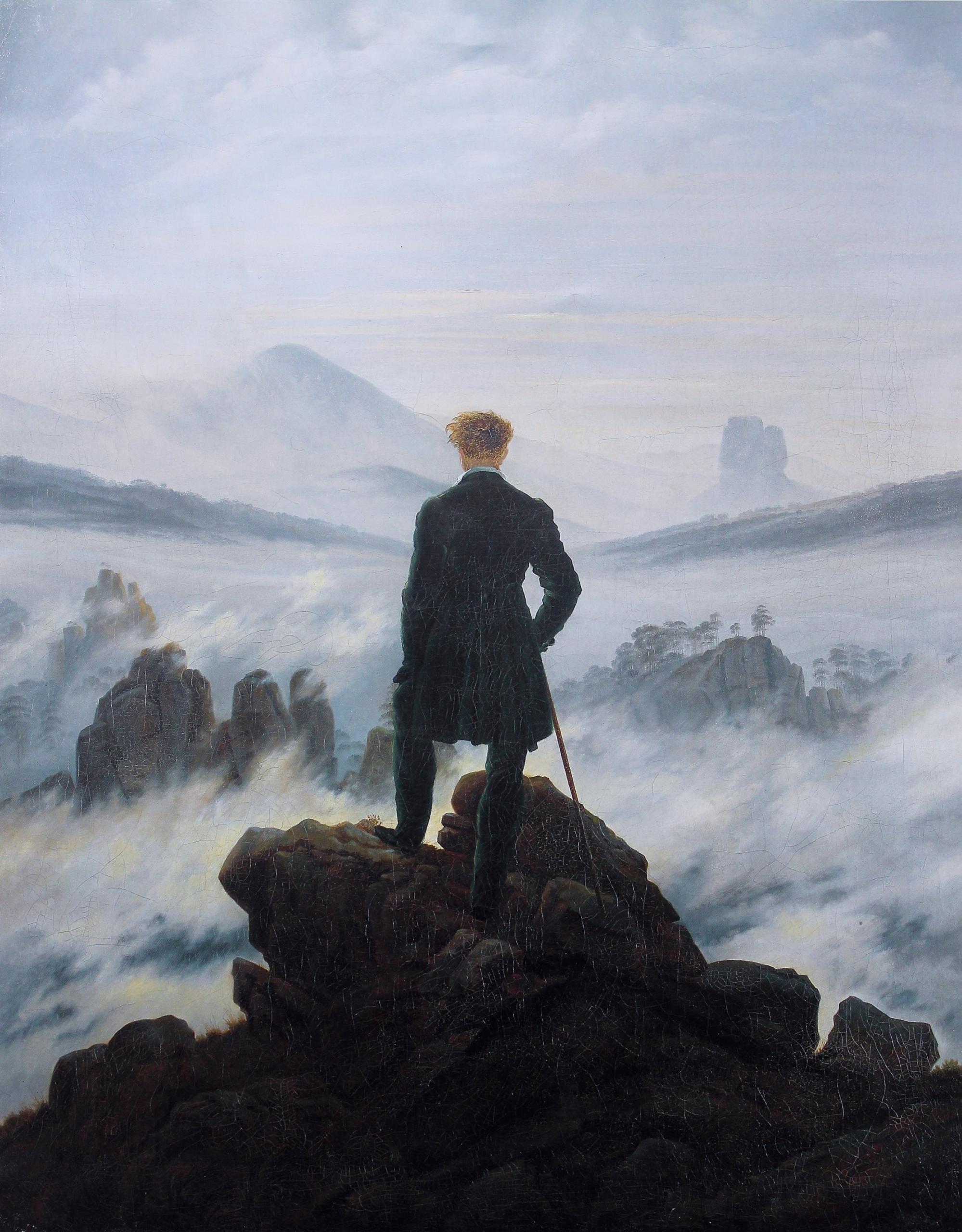 Auf dem Gemälde von Caspar David Friedrich schaut ein Wanderer aufs Nebelmeer