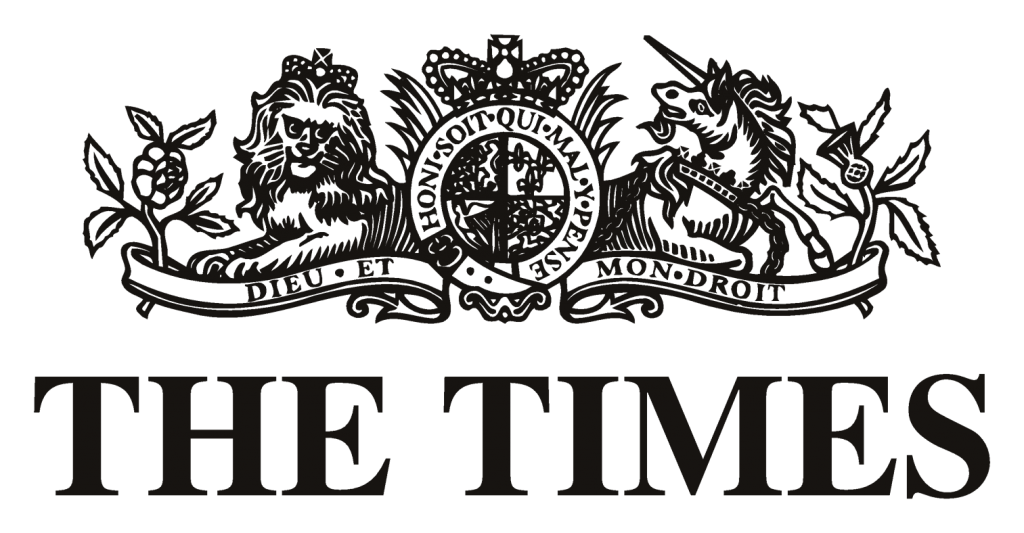 Emblema en el que un león y un unicornio flanquean un escudo sobre el texto «The Times». El diseño es recargado y transmite tradición y autoridad.
