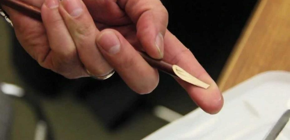 Escribir en lengua coránica.