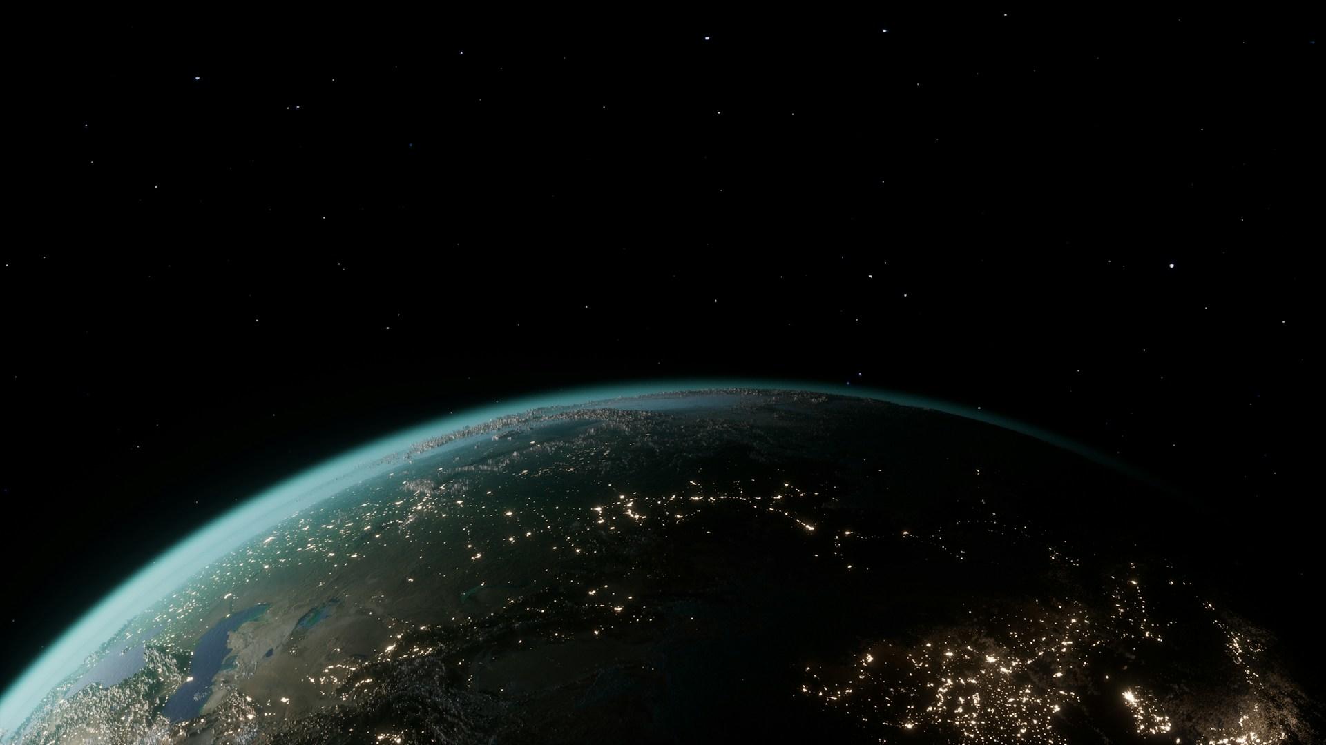 planeta tierra en la galaxia con luces de noche
