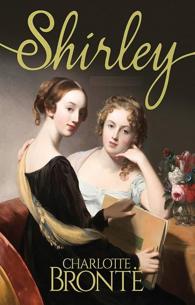 Dos mujeres con elegantes trajes del siglo XIX están sentadas muy juntas, una de ellas sostiene un libro. Miran al frente, rodeadas de flores. «Shirley», de Charlotte Brontë, aparece en negrita.