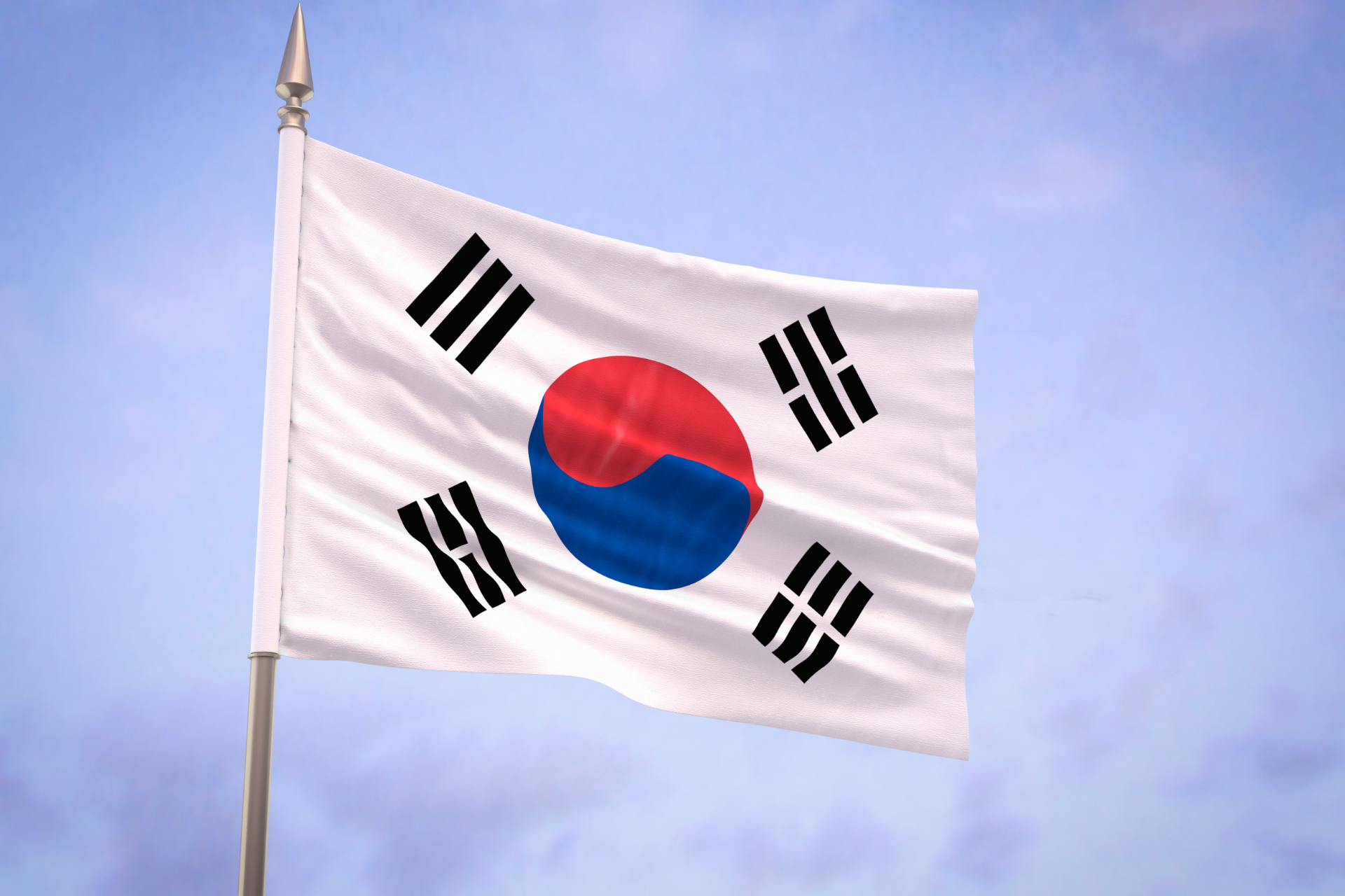 Bandera de Corea del Sur con un círculo rojo y azul en el centro y cuatro trigramas en las esquinas.