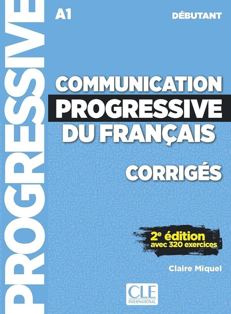 Portada azul de un libro titulado «Communication Progressive du Français, Corrigés», nivel A1, con texto en negrita y blanco y resaltado en negro y amarillo.