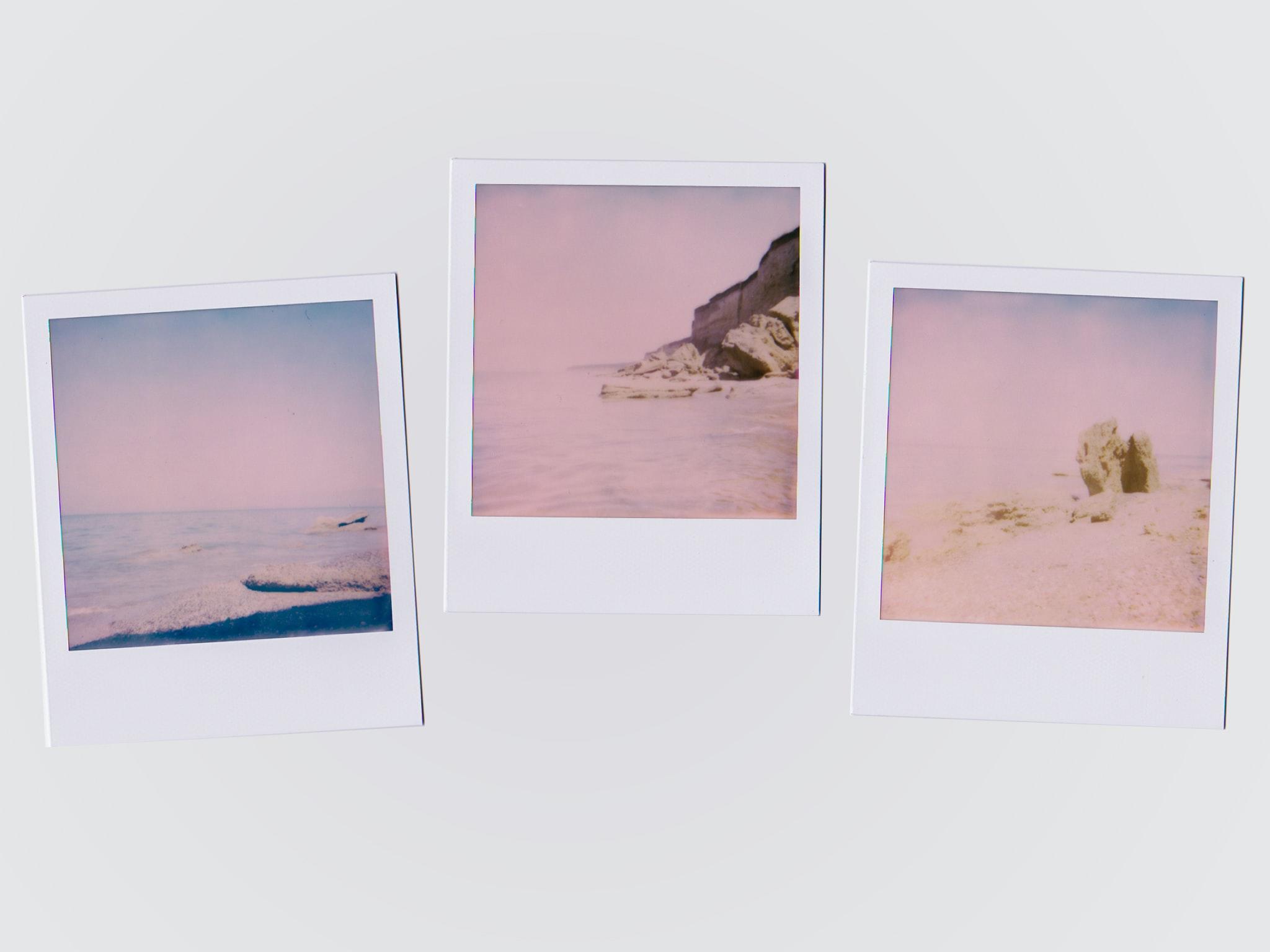 three photos on the wall