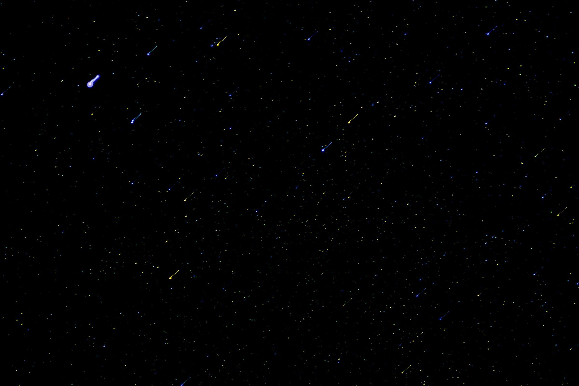 Tähdenlentoja pimeällä taivaalla