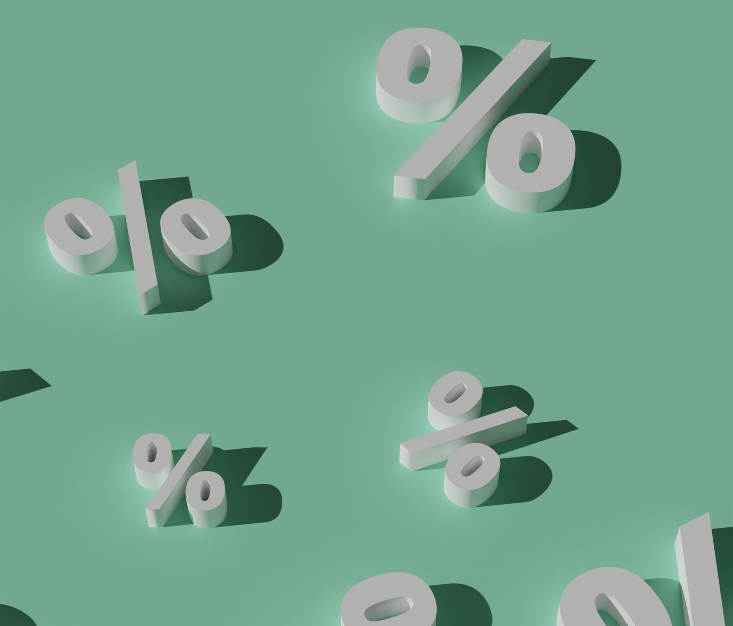 Procenttekens als illustratie van rentepercentages bij sparen en lenen | Ali Rezaei, via Unsplash