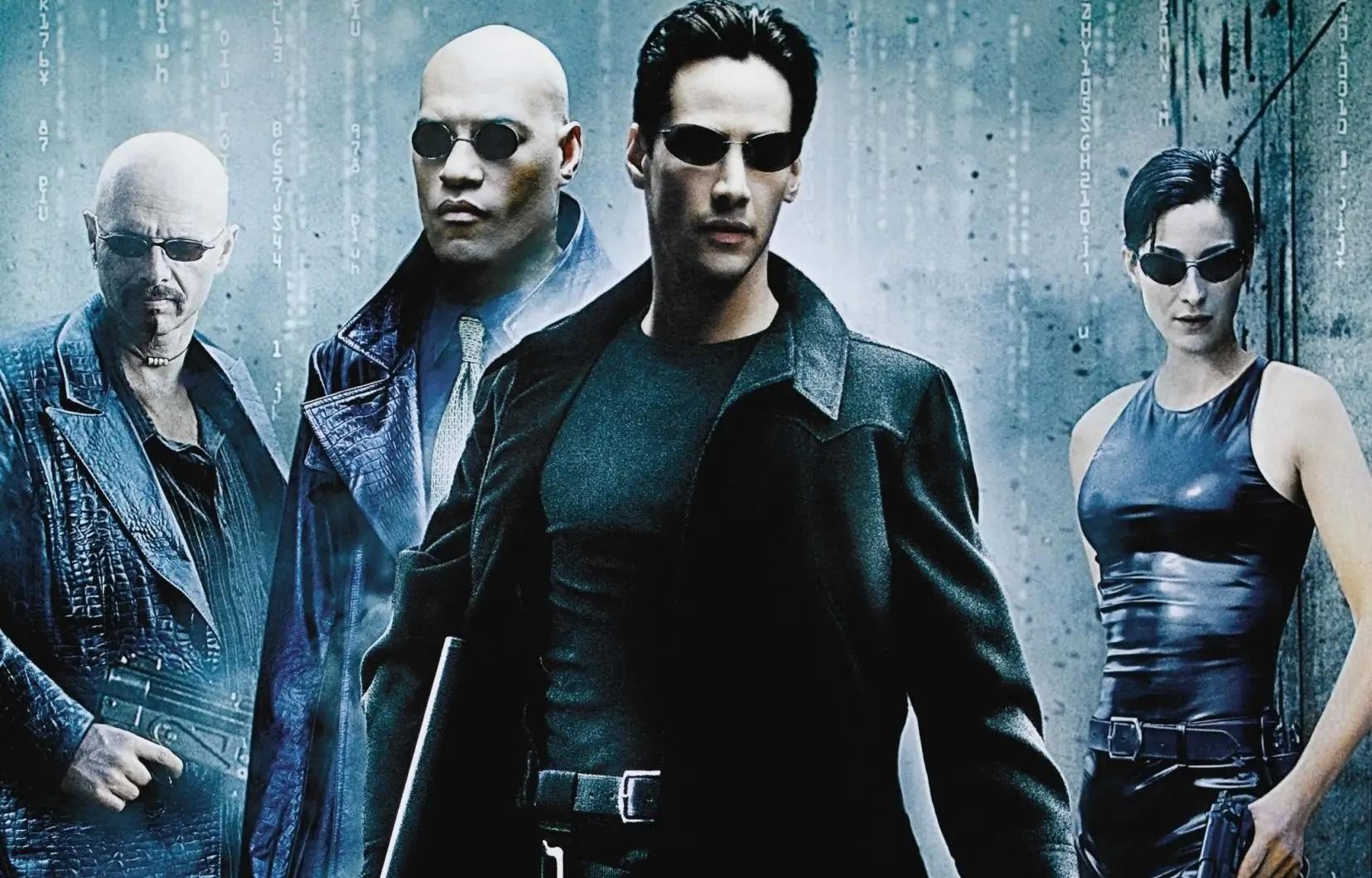 Les 4 personnages du film Matrix sont côte à côte. 
