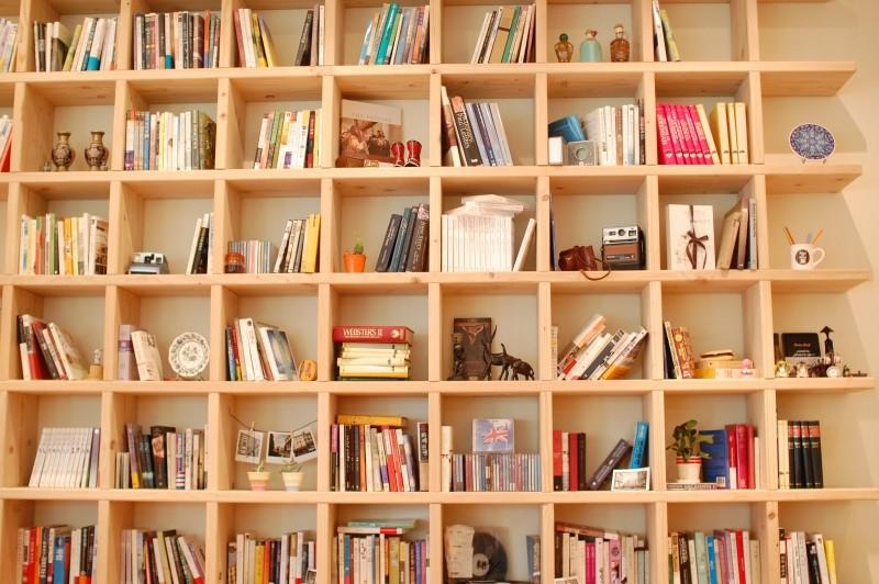 Fill bookcases with books so that children associate books with everyday tasks.