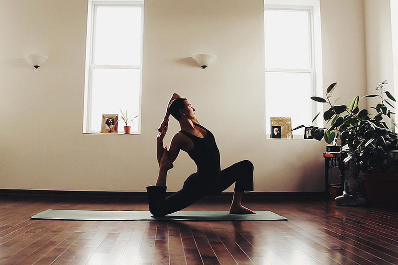 Listening to music during yoga can help relax the body and mind.