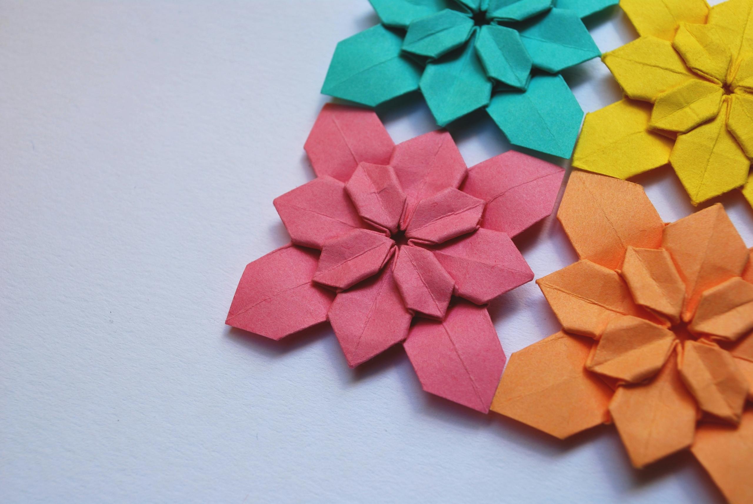 Coloured origami fabric cutouts in various colours