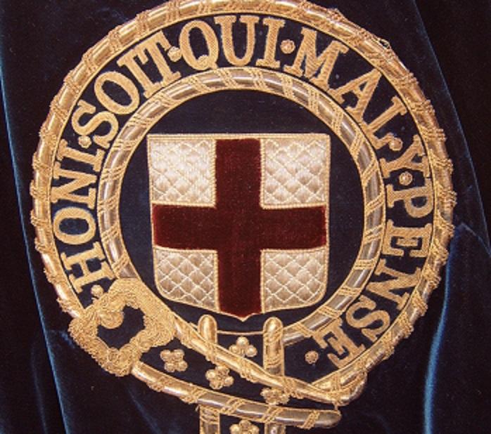 Did you think French words would ever appear on an English badge of Merit?