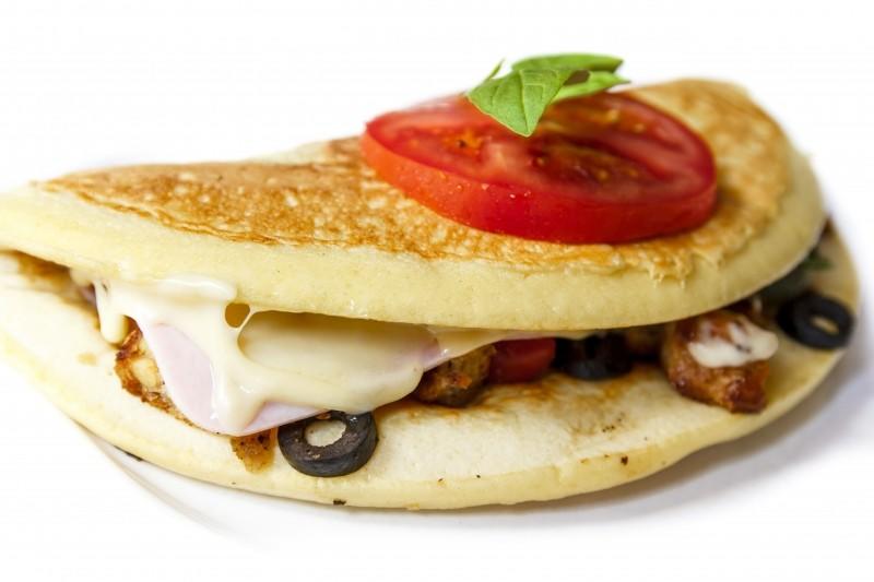 An omelette is a healthy meal accompanied with salad.