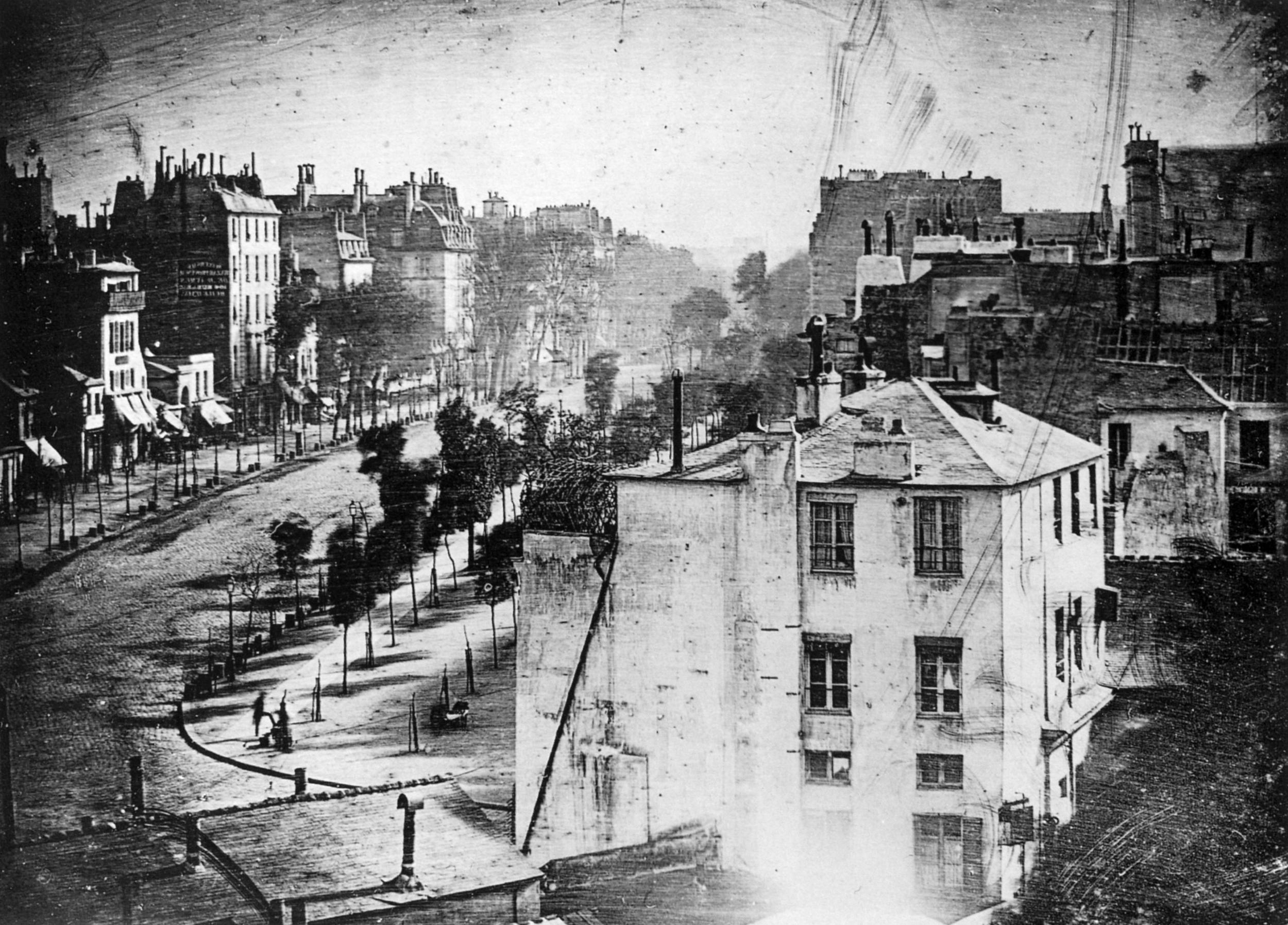 One of the earliest photos of busy street life, a daguerreotype