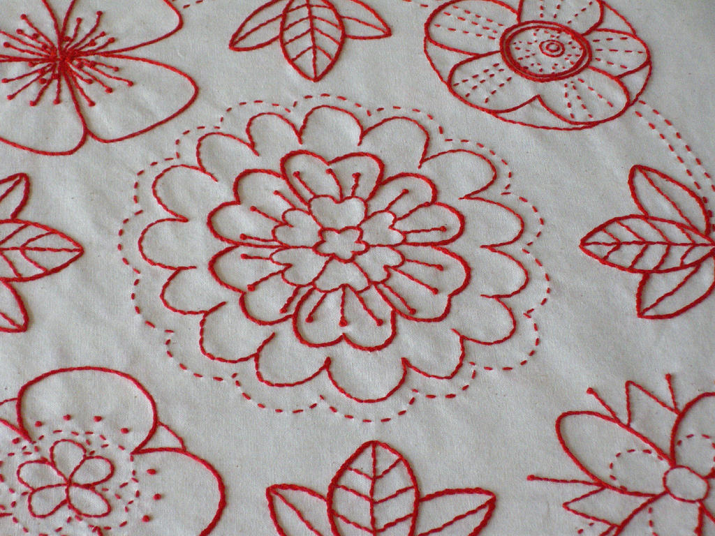 Redwork kits offer simple, monochrome designs.