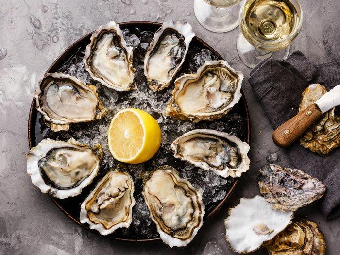 Enjoy freshly caught oysters with white wine