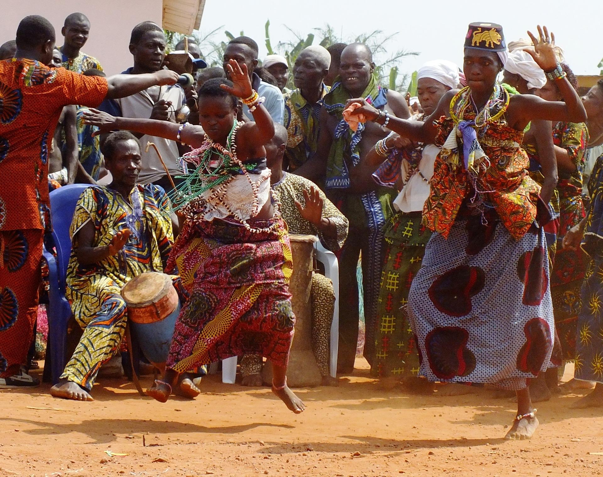 See native African people performing dances from their country.