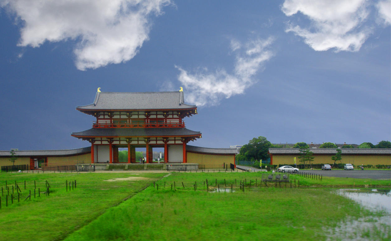 Historic architecture featuring a traditional Japanese gate.