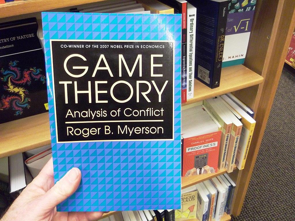 A picture of a game theory book. Game theory is an example of an economic theory.