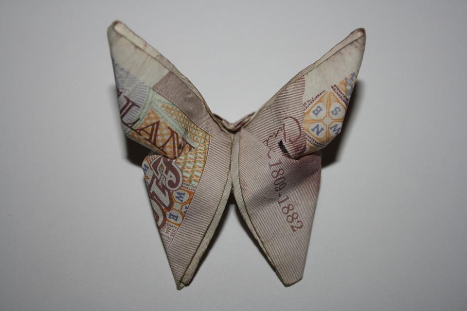 A folded UK bank note. Reading UK economic news can help broaden your understanding of the economy.