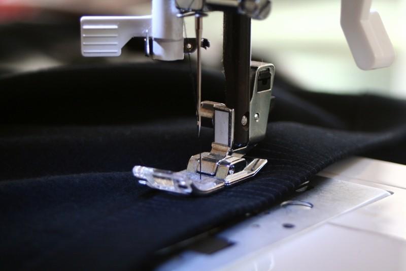 Sewing would originally have been done by hand using animal products as needles and thread.