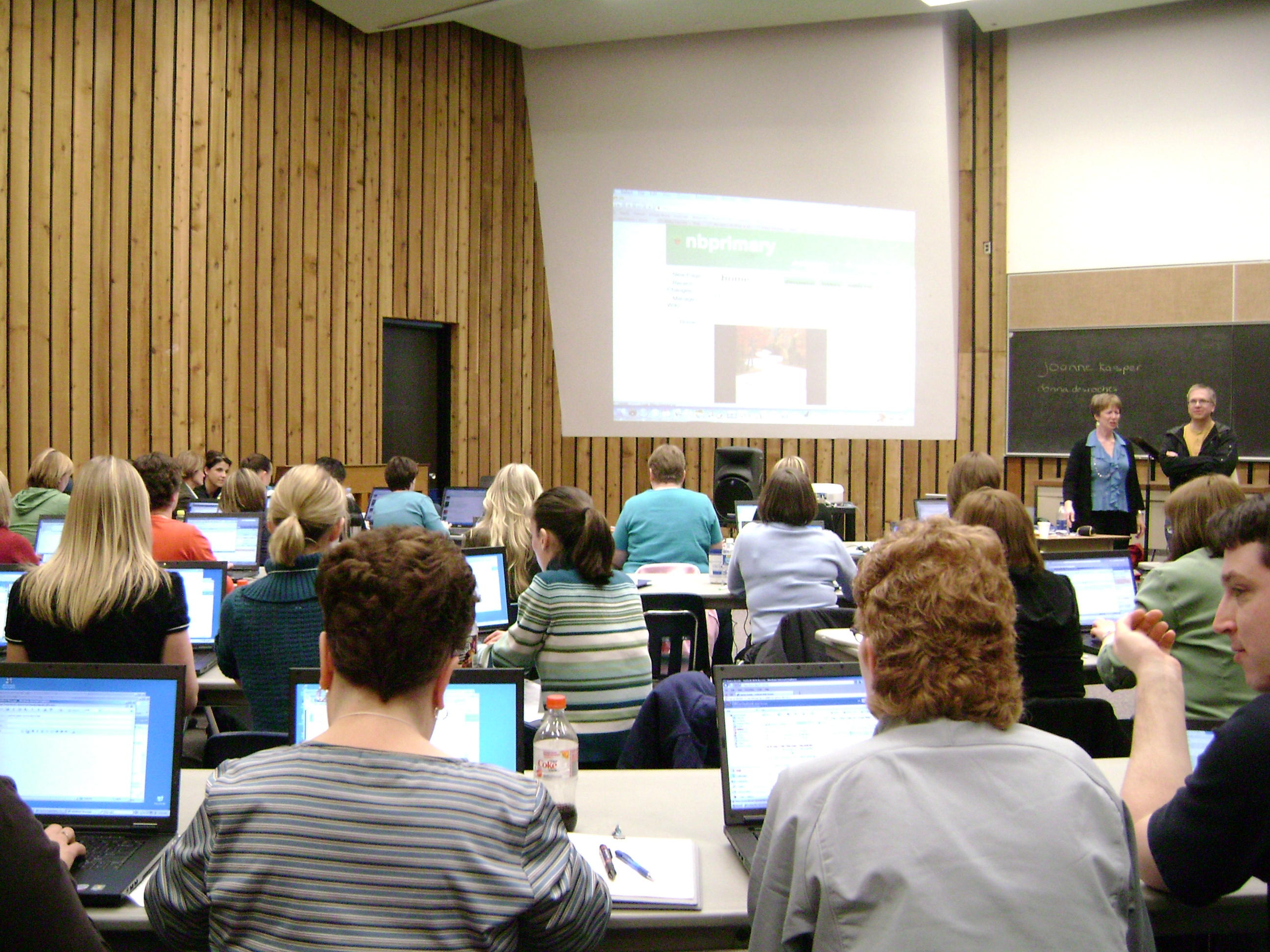 Teachers following a class.