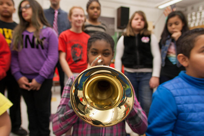 At music school, a pupil has far more time working on music theory and playing the instruments than at state school.