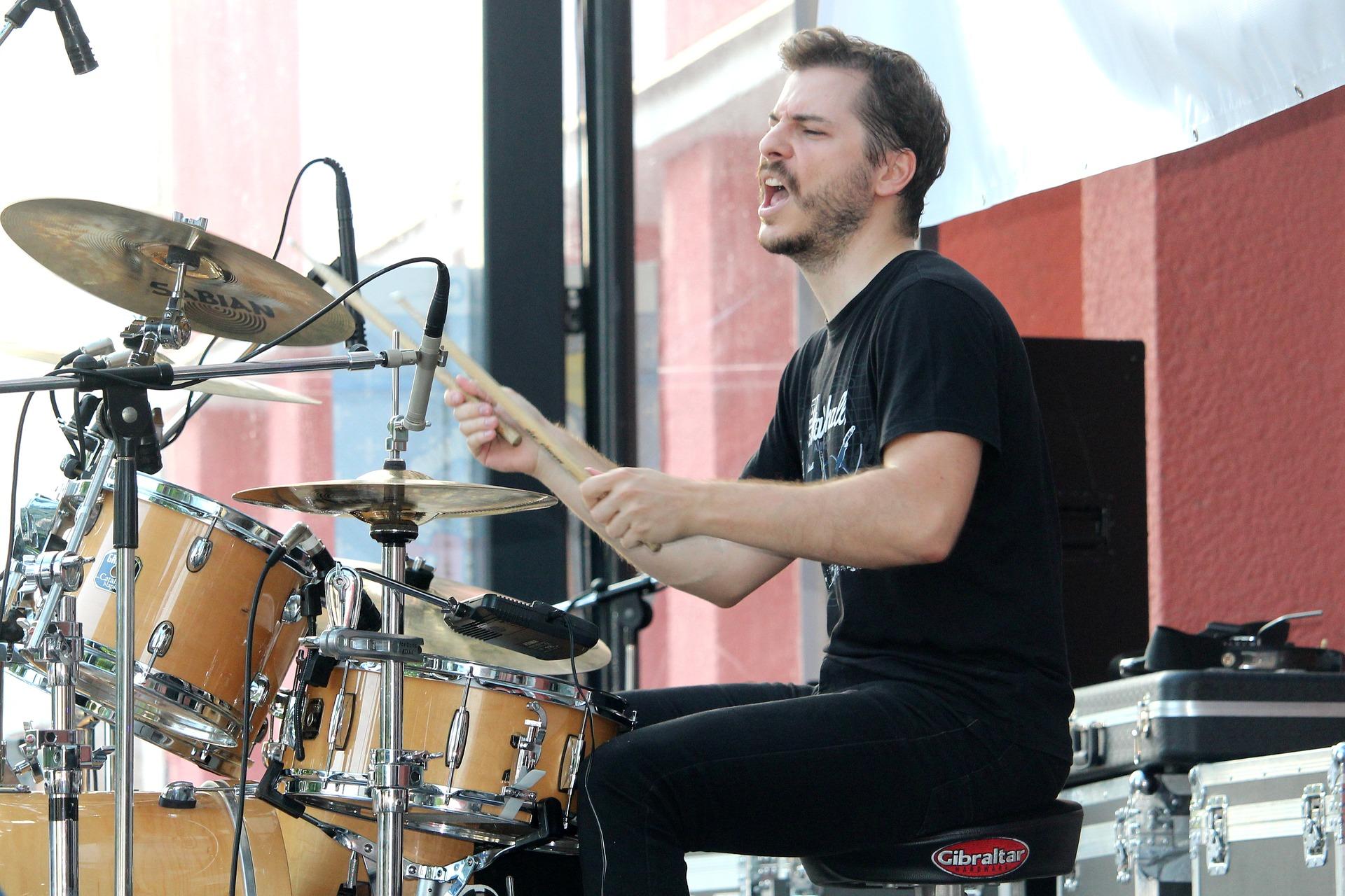 How can you learn to play the drums?