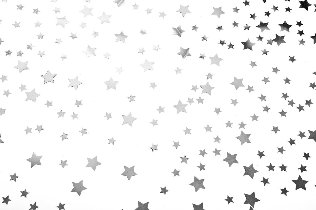 A background image of stars. Twinkle Twinkle Little Star is a famous nursery rhyme for children.