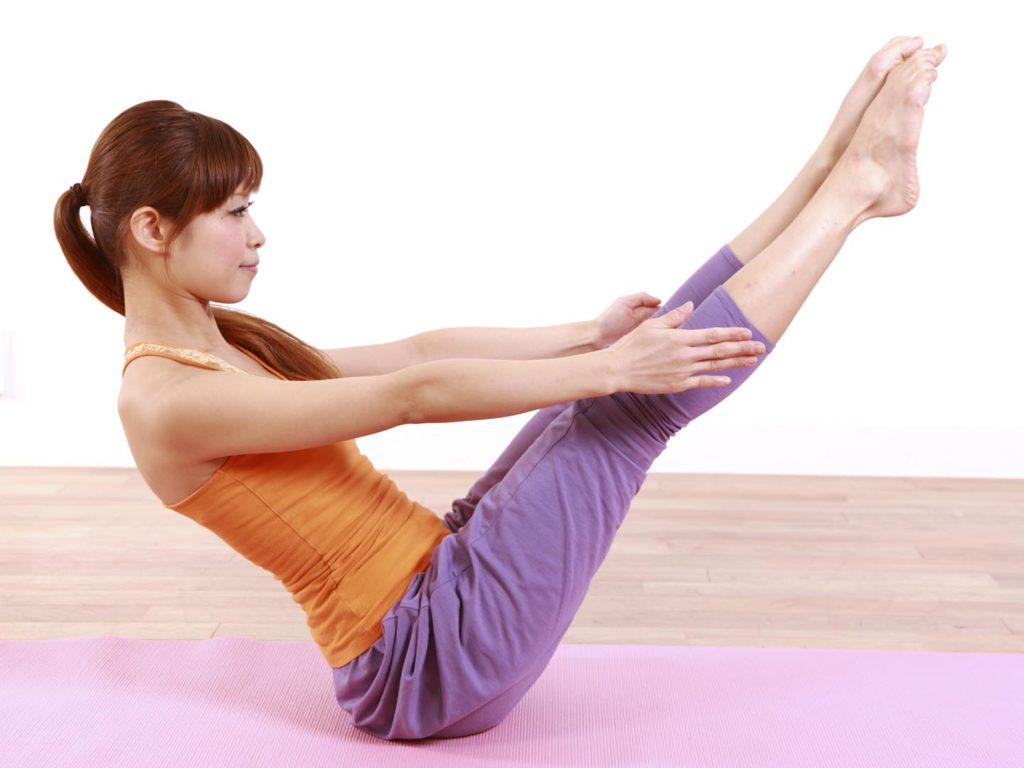 The boat pose is a good yoga challenge for your abs