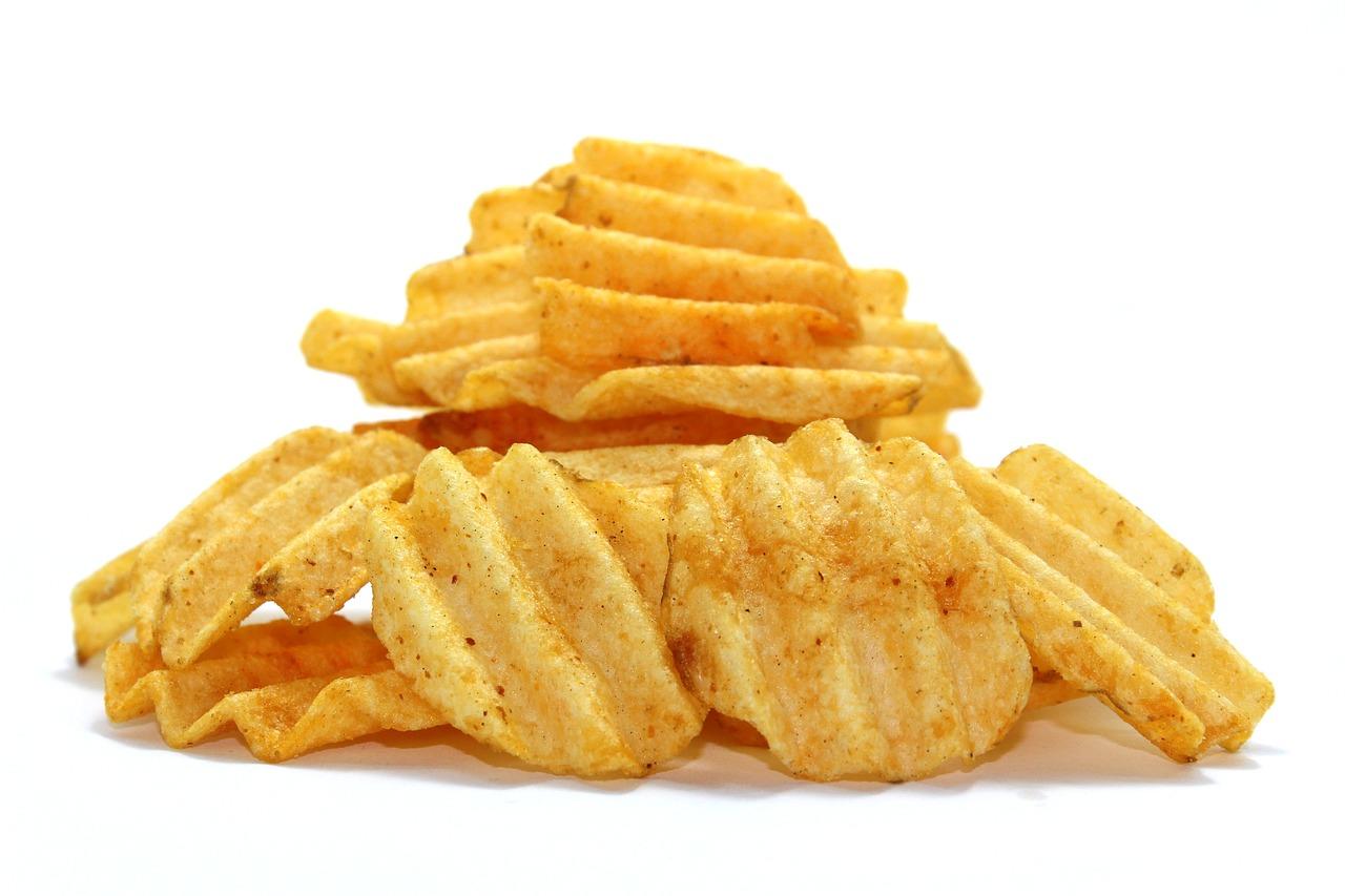 An image of a pile of crisps. Unhealthy snacks aren't good in high amounts when it comes to good nutrition for teenagers.