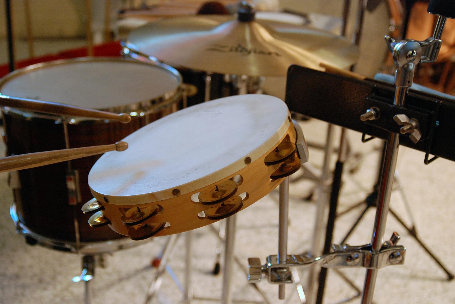 When should children start playing the drums?