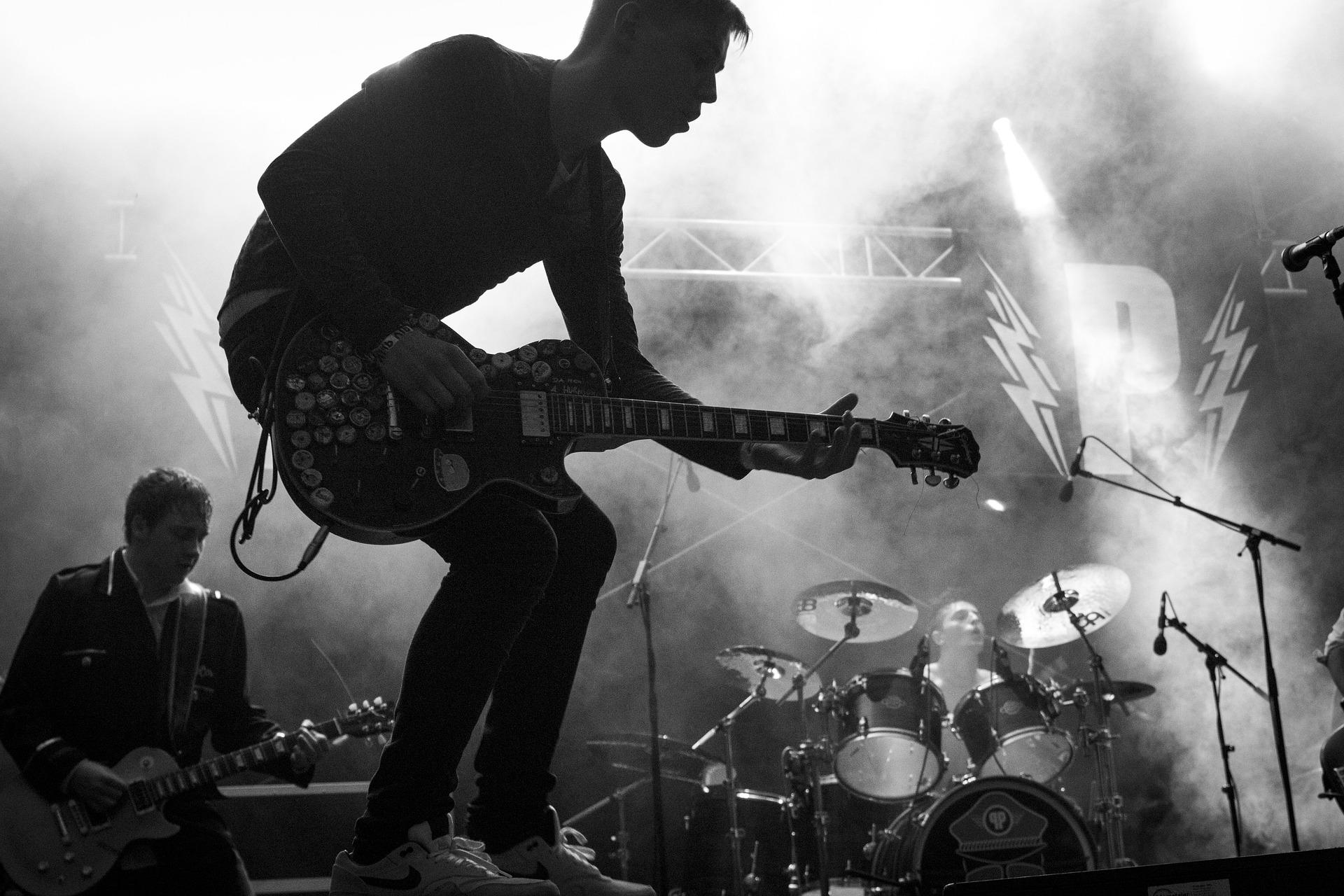What are the benefits of playing guitar?