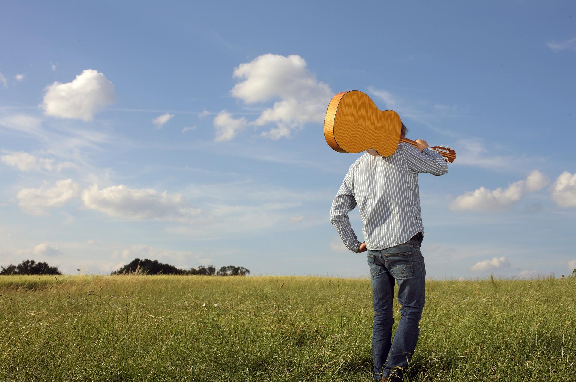 What are the benefits of playing the guitar?