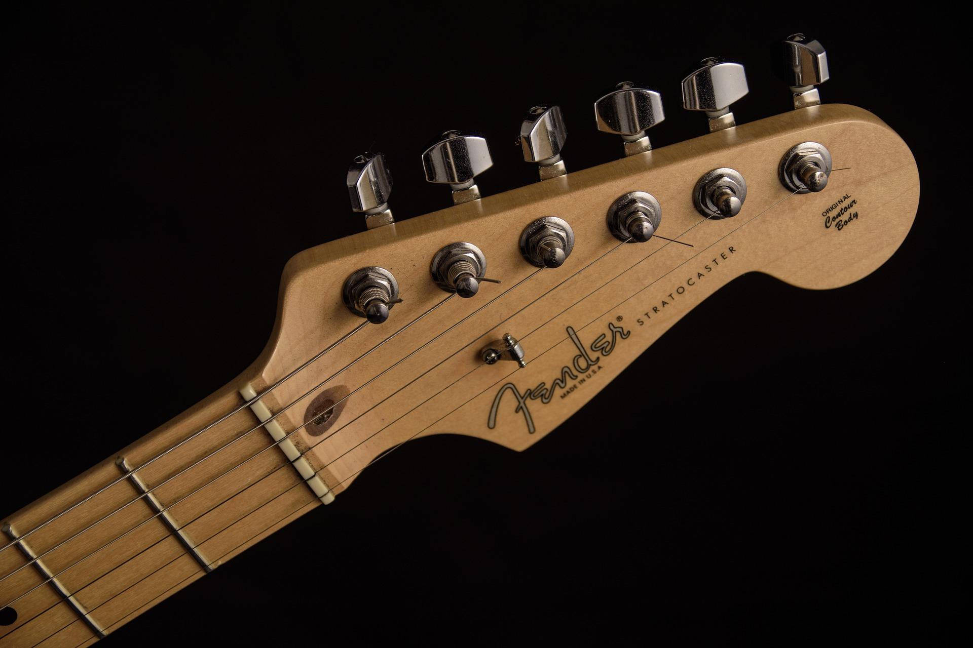 What are guitar inlays made of?