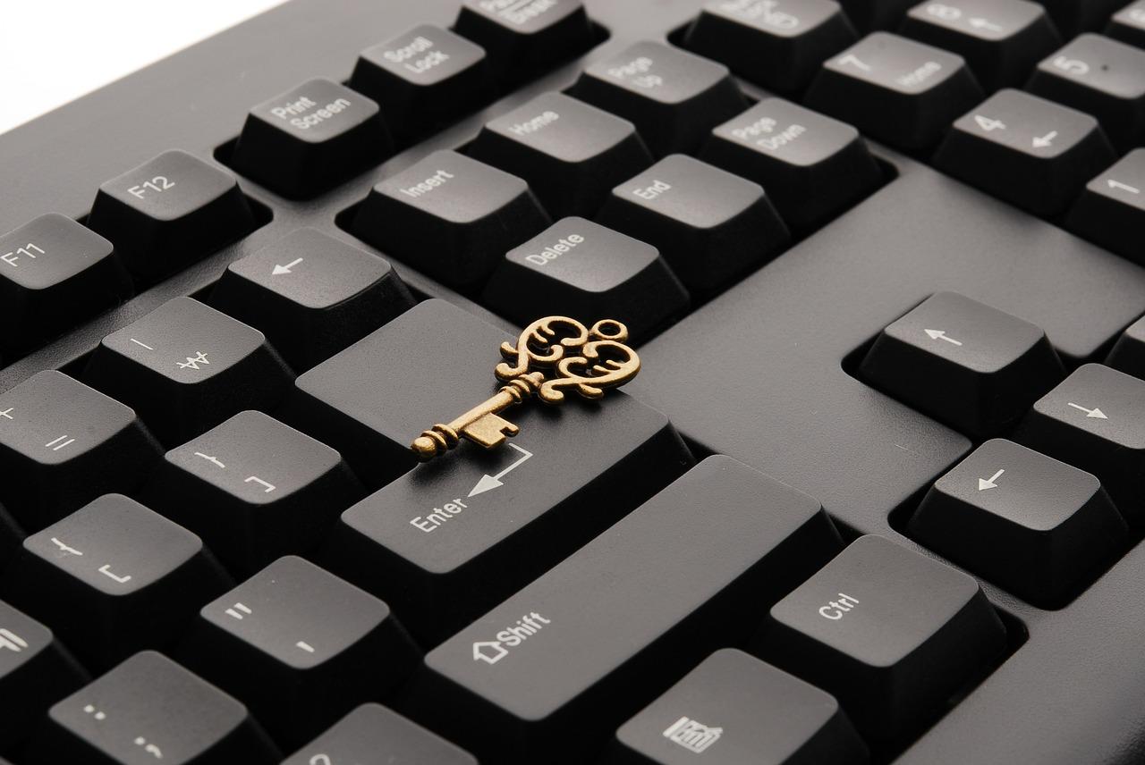 A photo of a small gold key sitting on top of the enter button on a black keyboard. Learning Russian in London can be really helpful if you intend to travel to Russia.